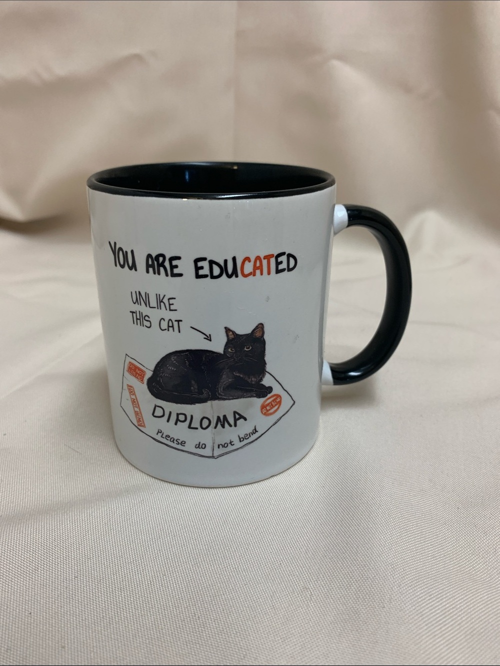 White Mug with Black Interior & Handle Featuring Black Cat Illustration